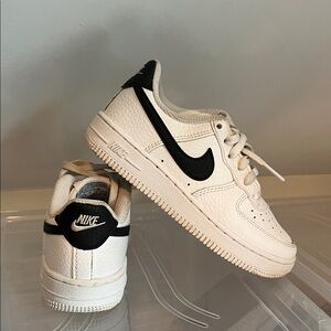Nike Air Force 1 Cream and Black Low-Top Sneakers